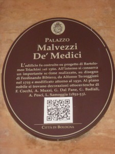 A QR code on a Medici plaque