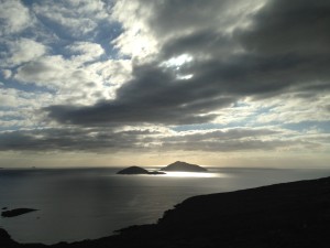 Stormy skies and sudden shafts of sunlight off the Iveragh Peninsula - Ireland's Wild Atlantic Coast